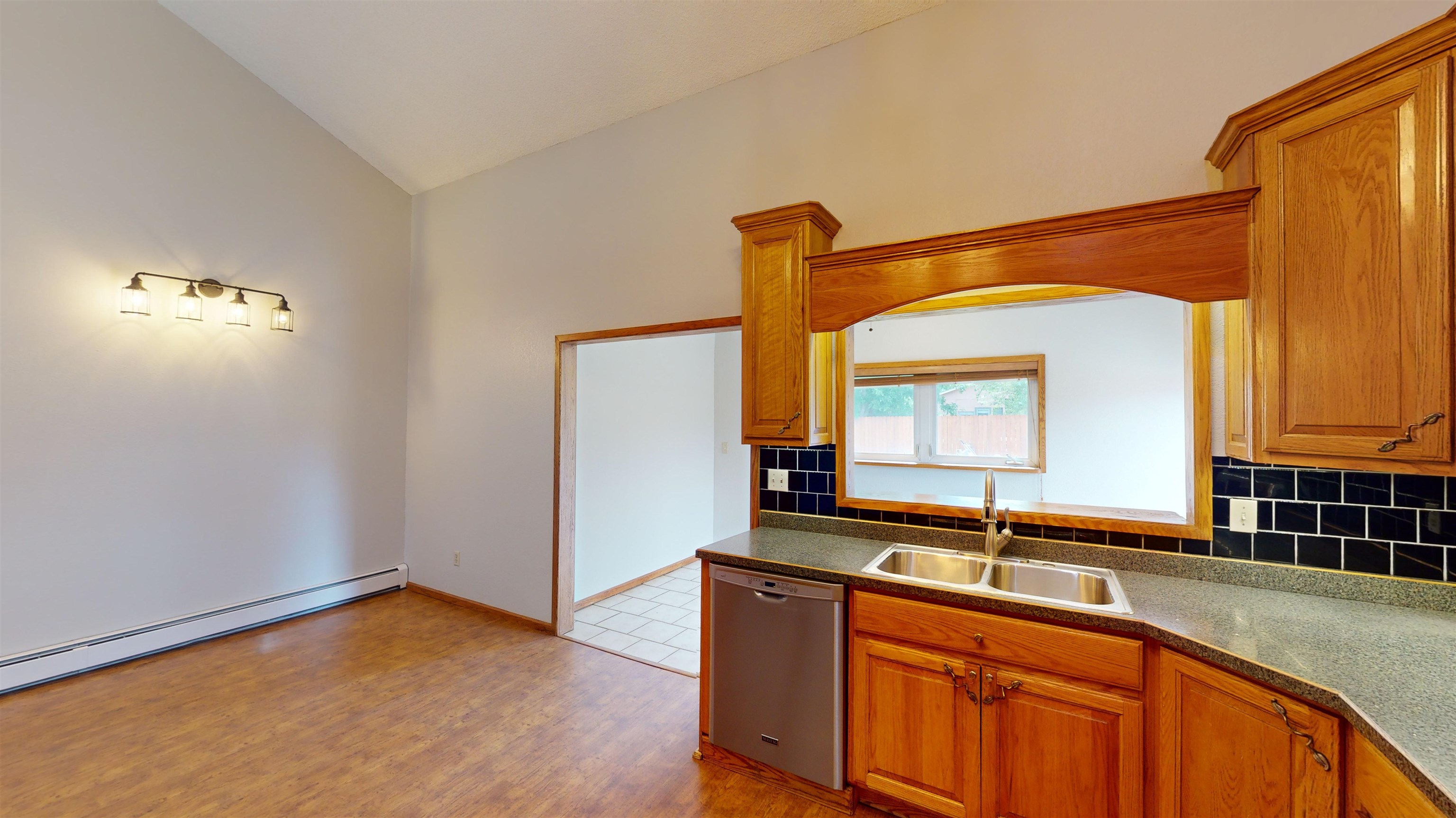 449 Doris Road Grand Junction, CO 81504 - Photo 9 of 35 a bathroom with a sink and a mirror