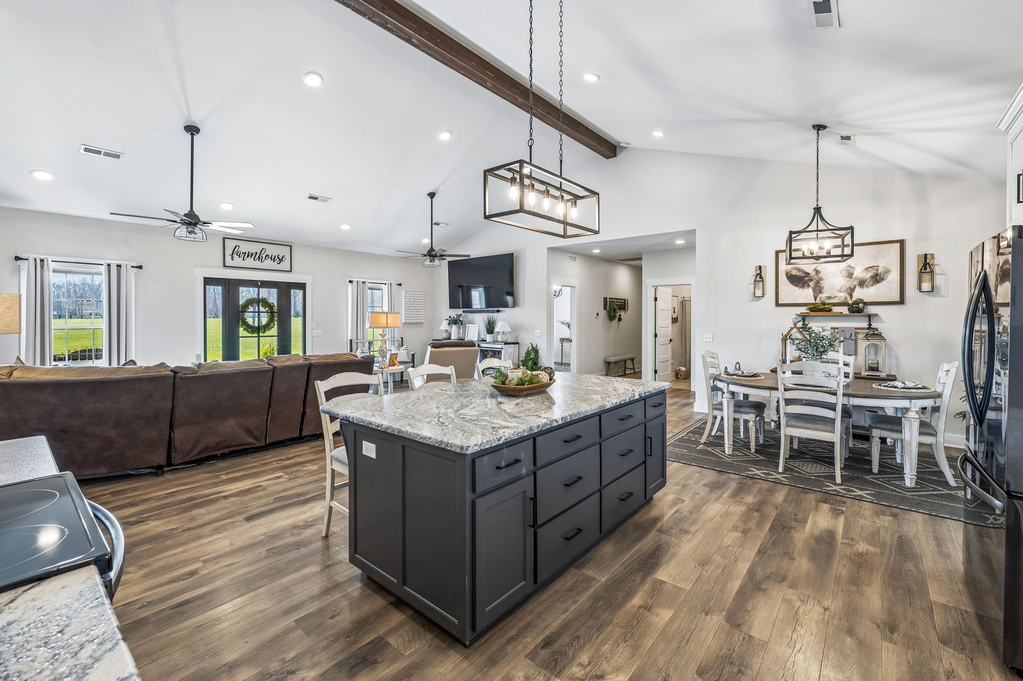 1869 Taurus Farm Road Lafayette, TN 37083 - Photo 18 of 60 a kitchen with stainless steel appliances granite countertop a lot of cabinets and wooden floor