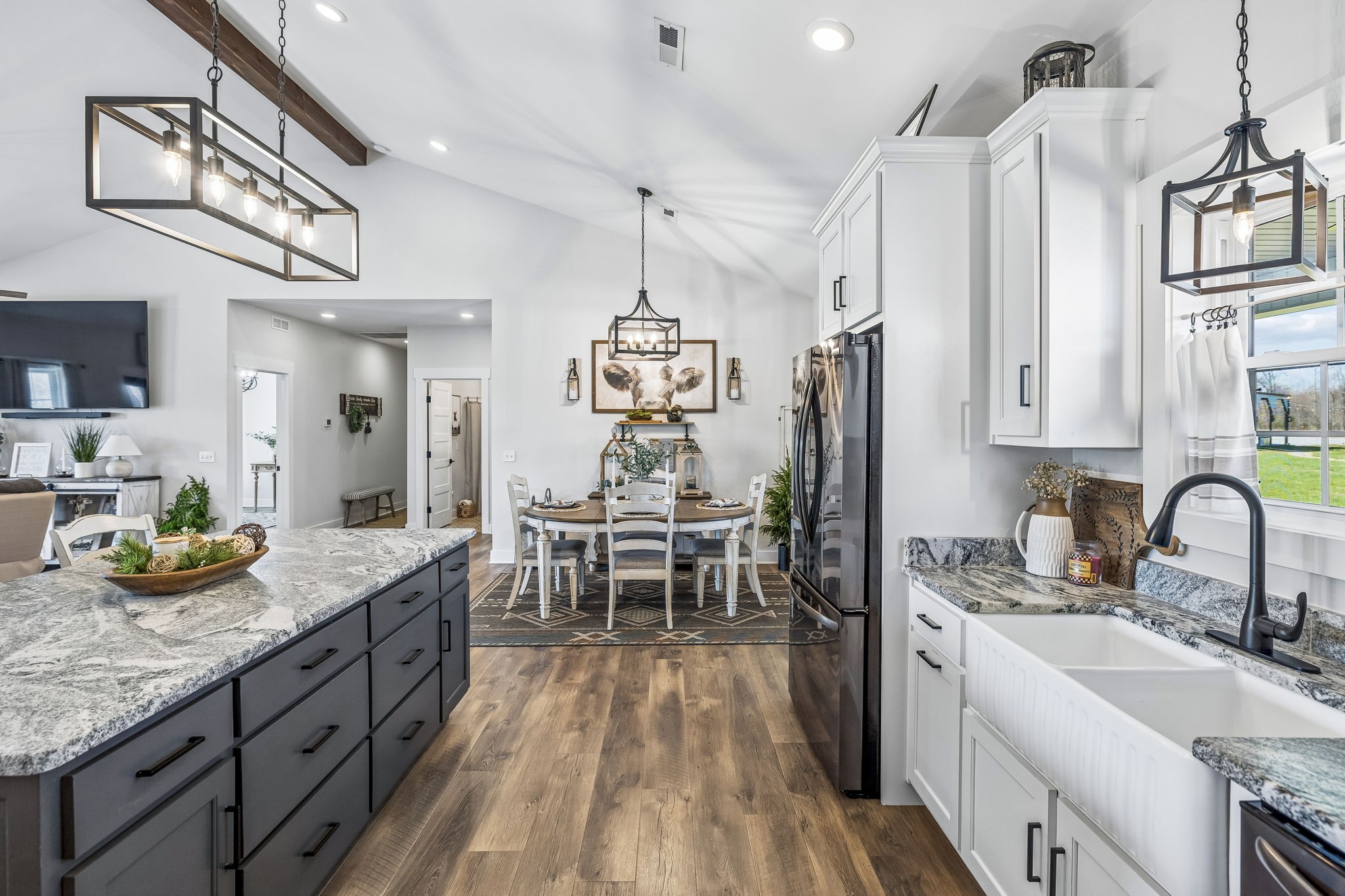 1869 Taurus Farm Road Lafayette, TN 37083 - Photo 19 of 60 a kitchen with granite countertop a sink stove and cabinets