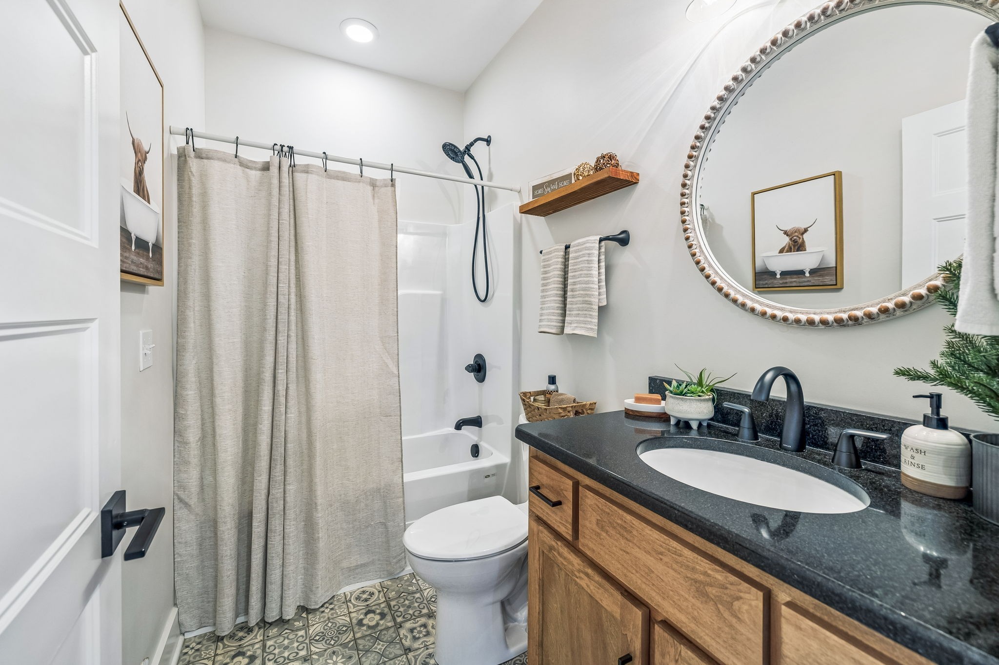 1869 Taurus Farm Road Lafayette, TN 37083 - Photo 25 of 60 a bathroom with a granite countertop sink mirror vanity and toilet
