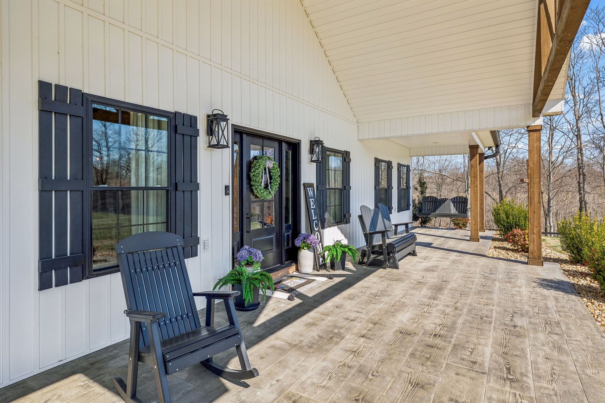 1869 Taurus Farm Road Lafayette, TN 37083 - Photo 7 of 60 a lobby with furniture and floor to ceiling window