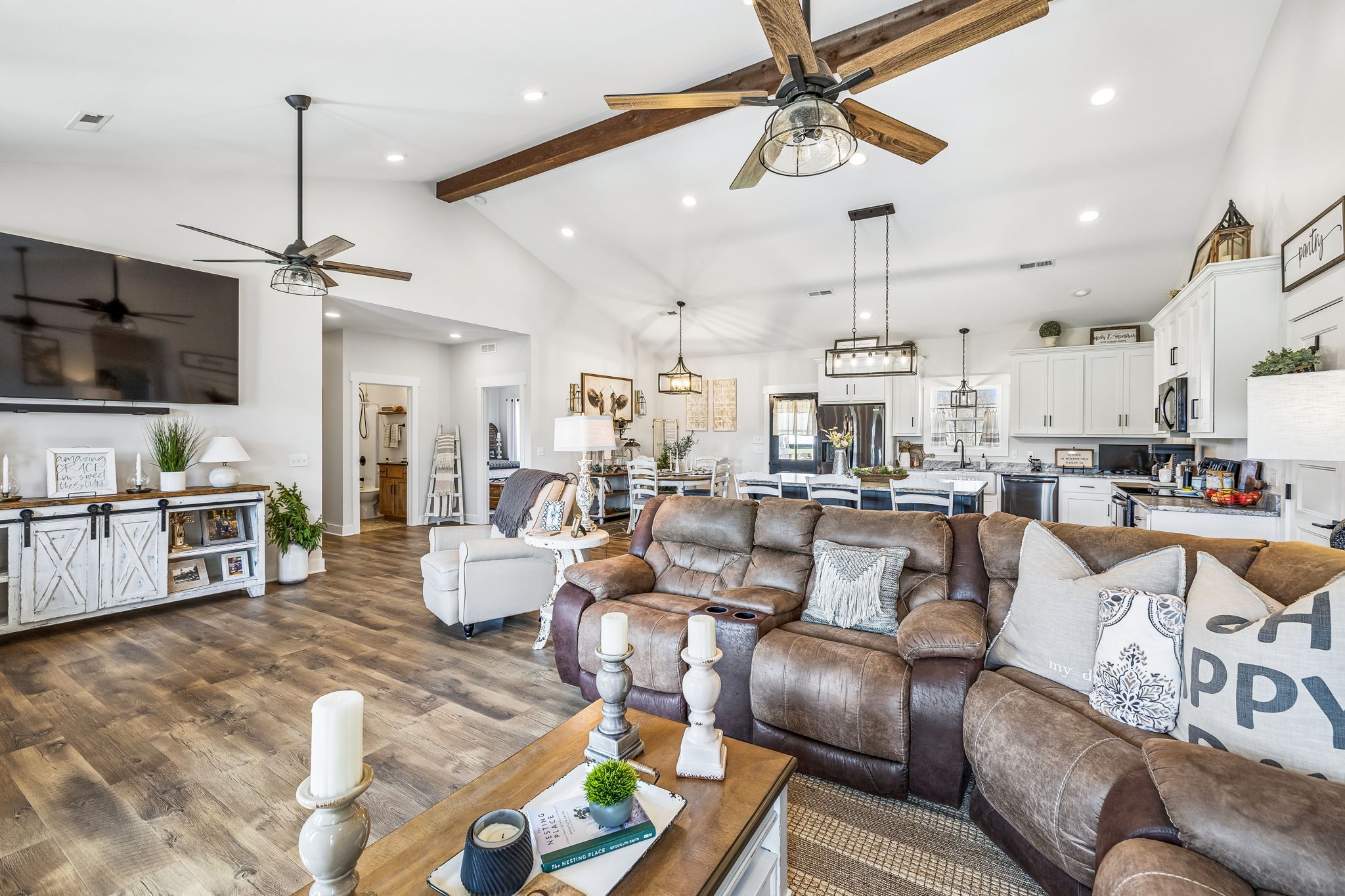 1869 Taurus Farm Road Lafayette, TN 37083 - Photo 10 of 60 a living room with furniture kitchen view and a flat screen tv