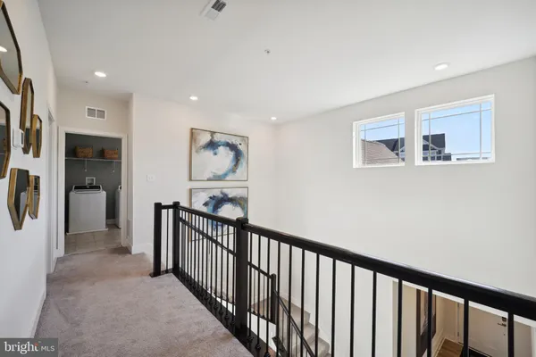 a view of a hallway with interior of the house