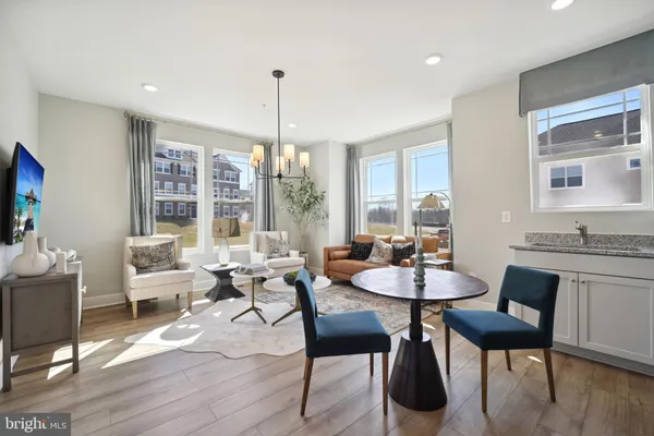 a view of a dining room with furniture window and outside view