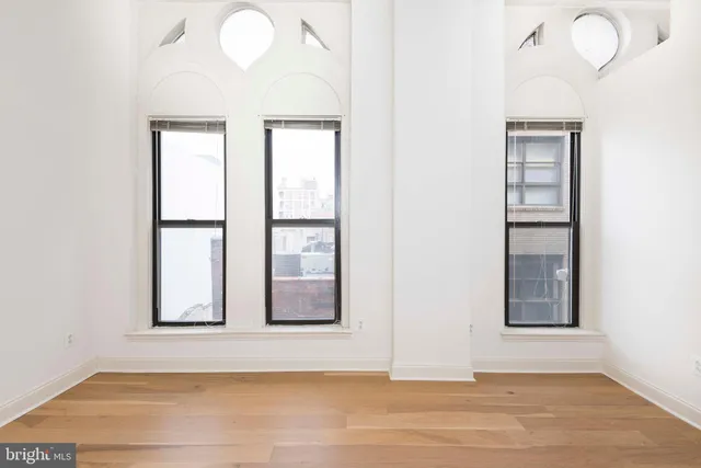 a bathroom with a bathtub and a sink