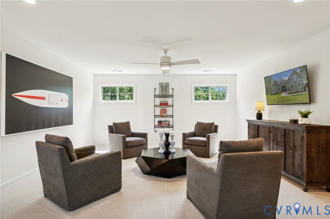 3936 Robins Ridge Drive Moseley, VA 23120 - Photo 17 of 24 a living room with furniture and a flat screen tv