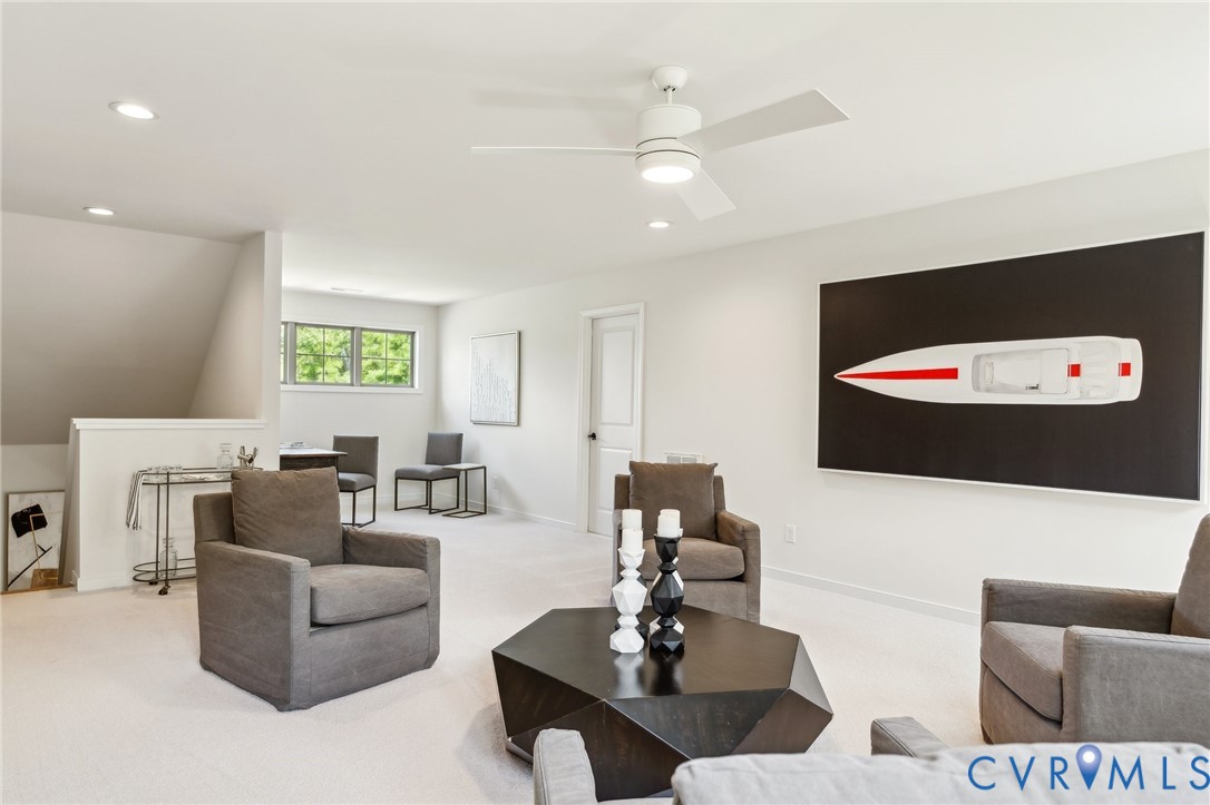 3936 Robins Ridge Drive Moseley, VA 23120 - Photo 18 of 24 a living room with furniture and a large window