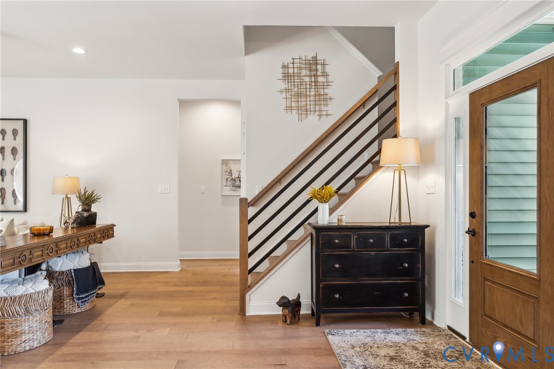3936 Robins Ridge Drive Moseley, VA 23120 - Photo 5 of 24 a view of a bedroom with workspace and stairs