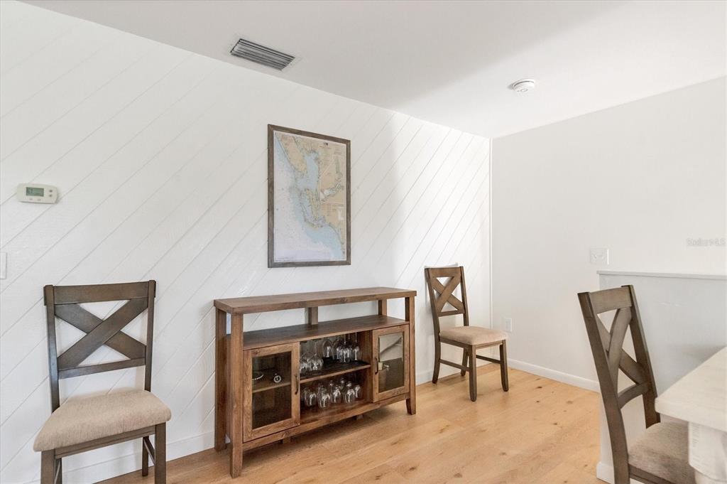 261 Lee Avenue Boca Grande, FL 33921 - Photo 11 of 48 a living room with furniture and a fireplace