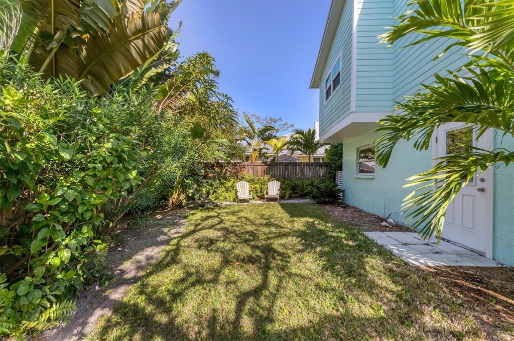 261 Lee Avenue Boca Grande, FL 33921 - Photo 40 of 48 a view of a yard with plants