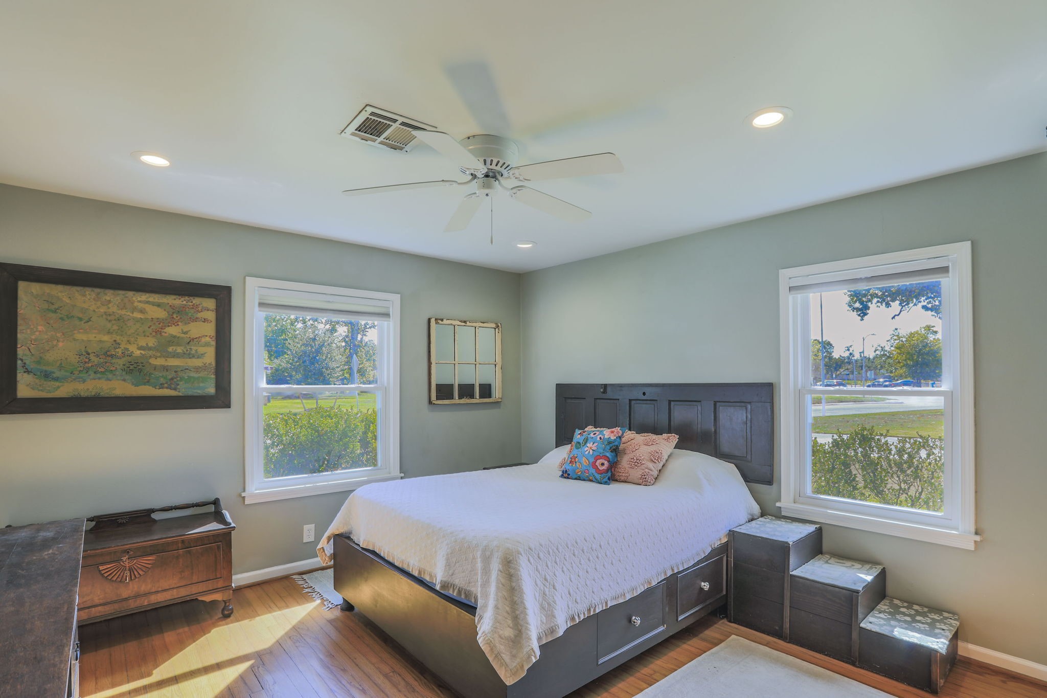 1111 Woodhill Road Houston, TX 77008 - Photo 12 of 42 a bedroom with a bed and window