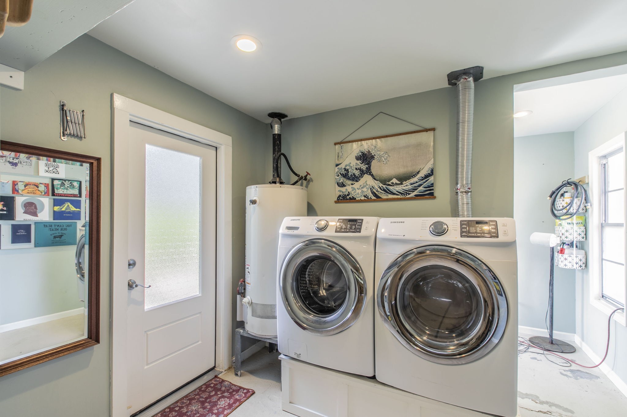 1111 Woodhill Road Houston, TX 77008 - Photo 20 of 42 a view of a hallway with washer and dryer