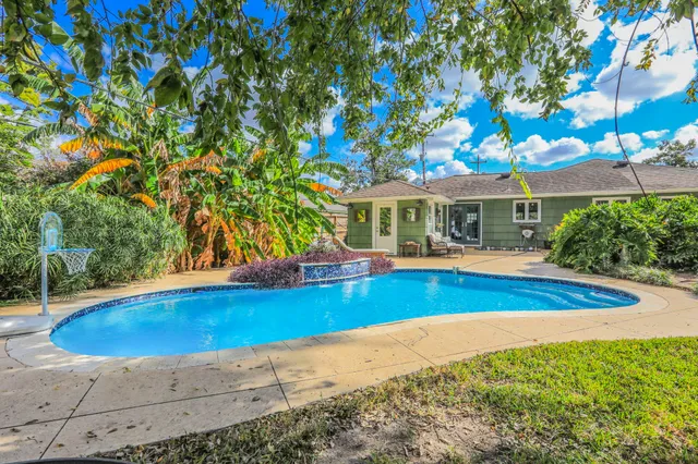 a view of outdoor space yard and swimming pool