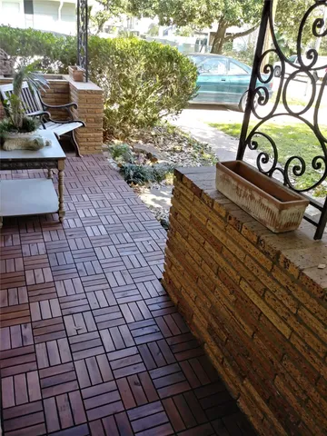 a view of a street with sitting area