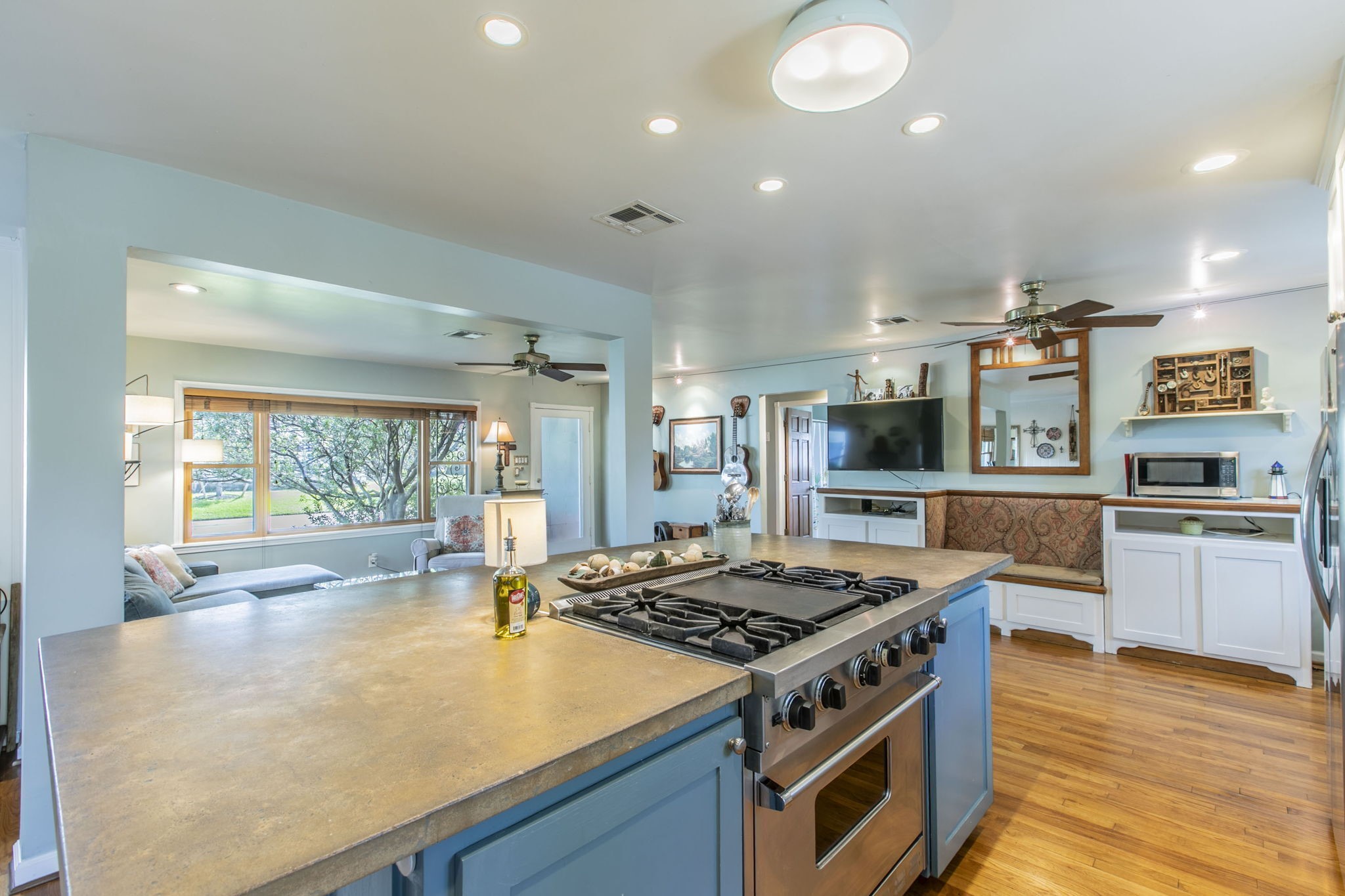 1111 Woodhill Road Houston, TX 77008 - Photo 10 of 42 a kitchen with stainless steel appliances granite countertop a stove and a sink