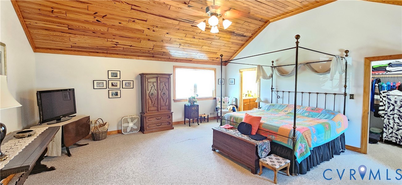 617 Sheepside Road Laneview, VA 22504 - Photo 8 of 9 Vaulted wood-paneled ceiling featuring a ceiling f