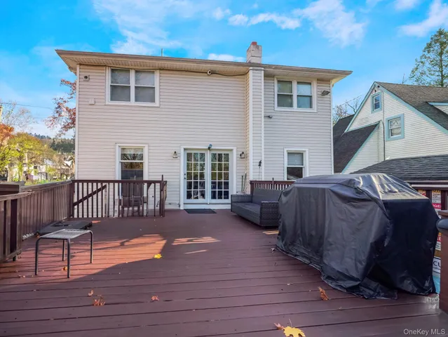a view of a house with wooden floor roof