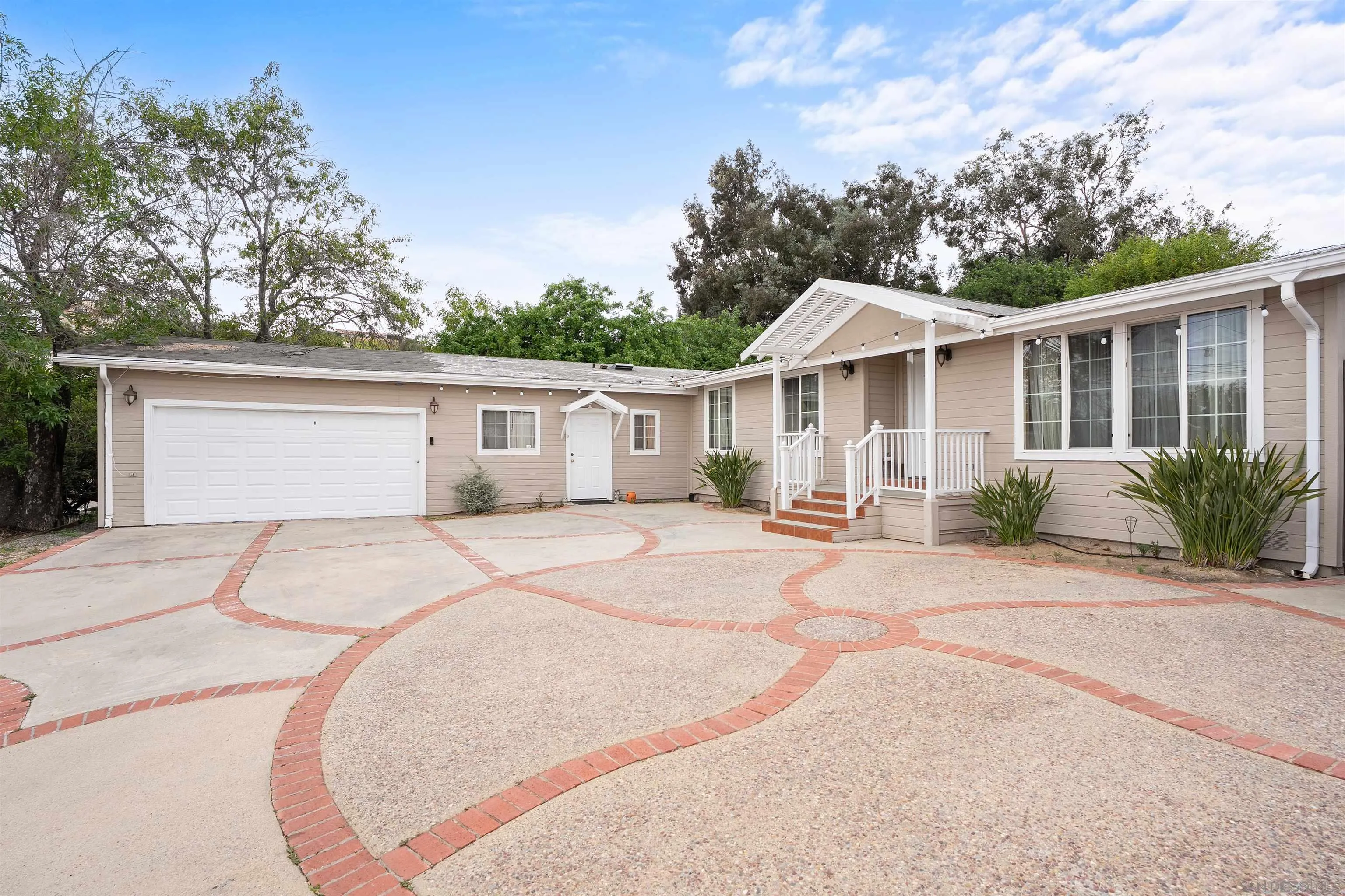 12452 Janet Kay Way El Cajon, CA 92021 - Photo 2 of 30 front view of a house with a patio