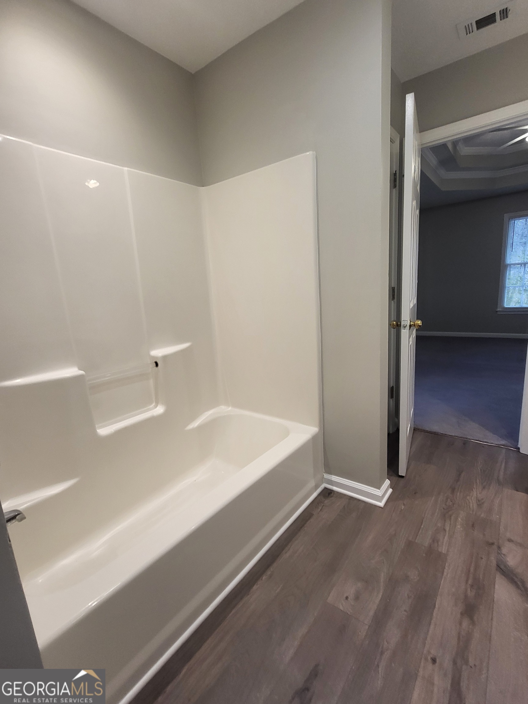 112 Sundown Drive Dawsonville, GA 30534 - Photo 17 of 25 a bathroom with a bathtub and a sink