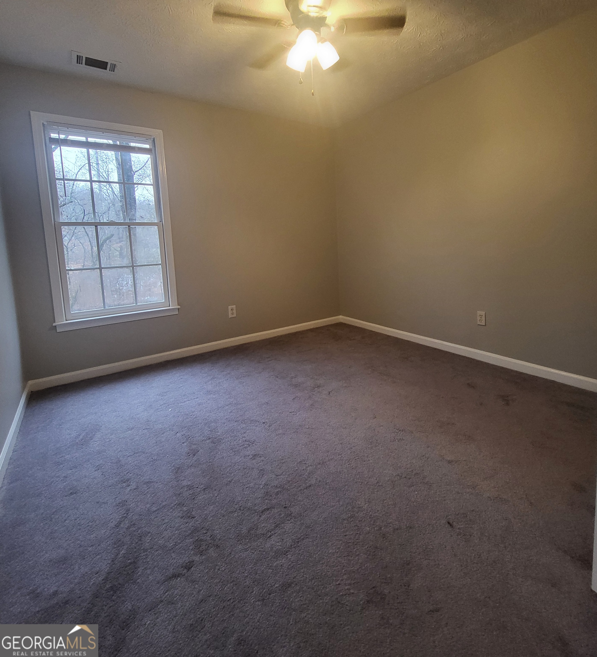 112 Sundown Drive Dawsonville, GA 30534 - Photo 20 of 25 an empty room with a empty space and windows