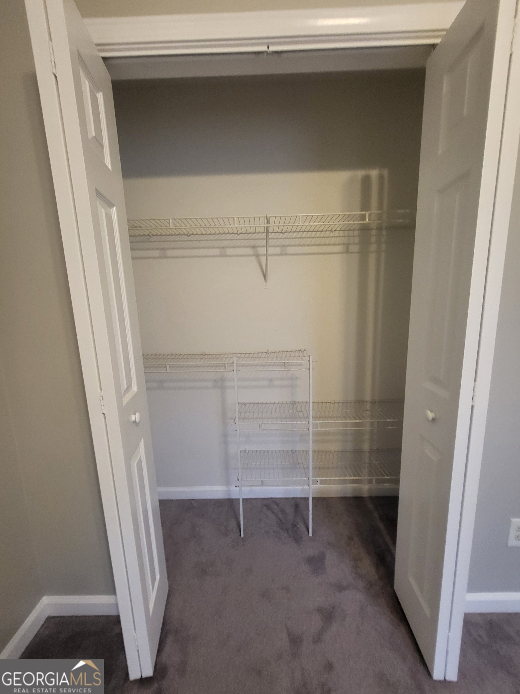 112 Sundown Drive Dawsonville, GA 30534 - Photo 22 of 25 a view of walk in closet