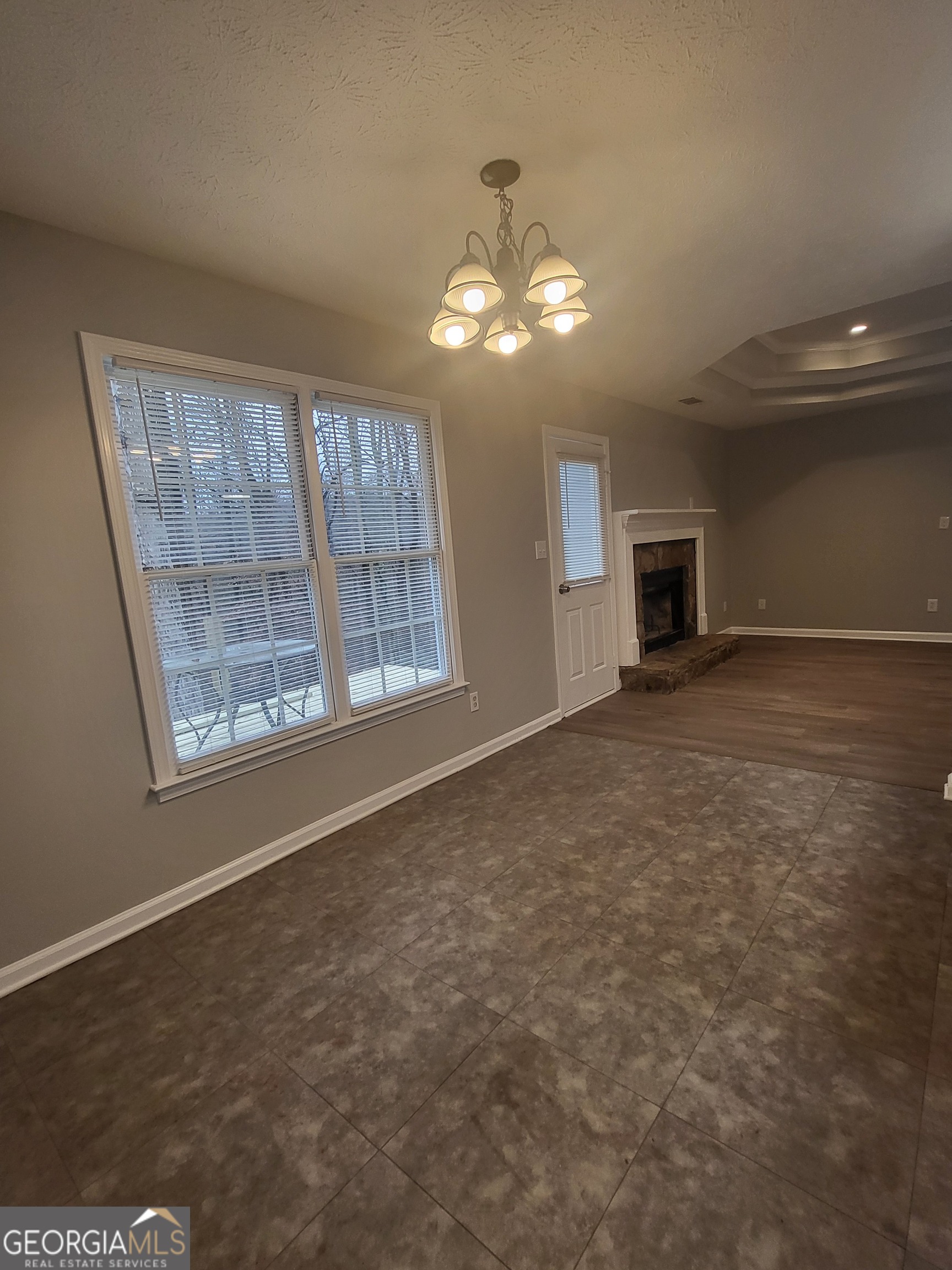 112 Sundown Drive Dawsonville, GA 30534 - Photo 10 of 25 a view of an empty room with a window