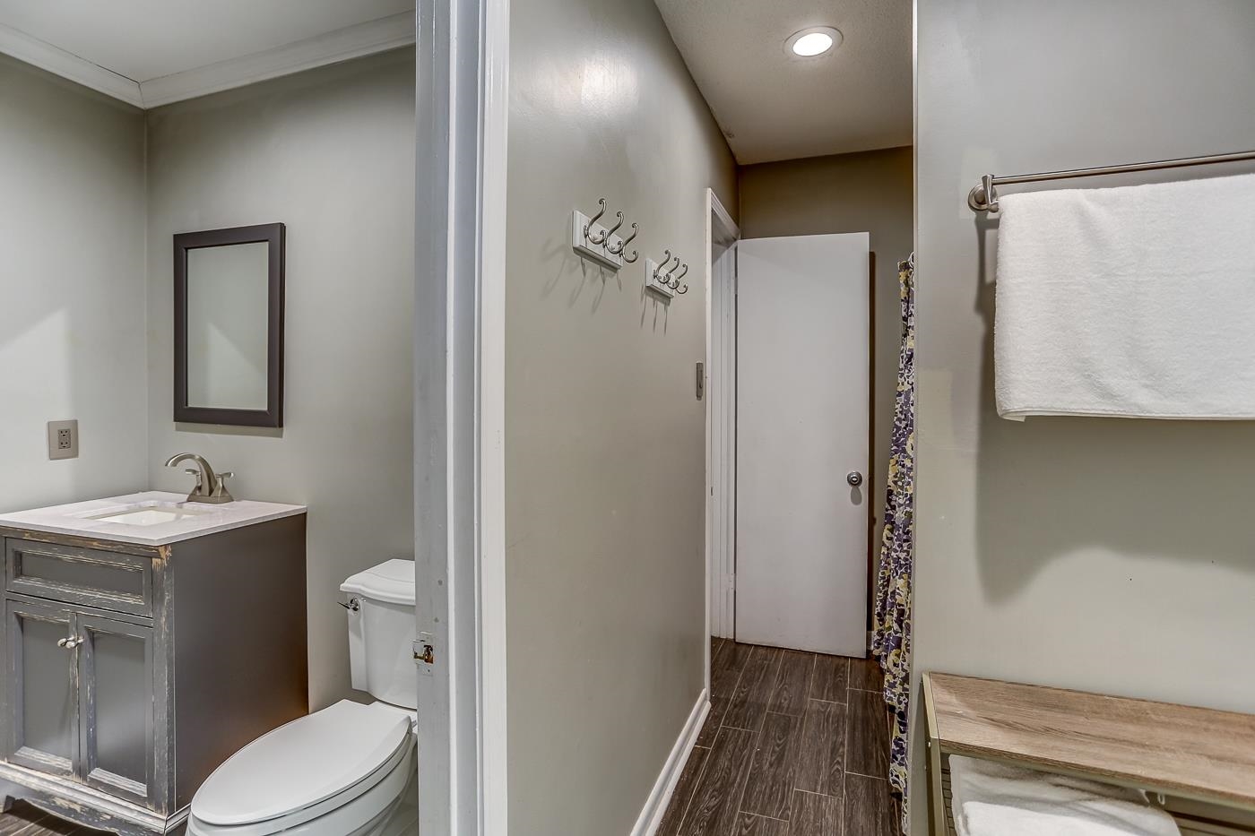 470 Metro Road Eads, TN 38028 - Photo 12 of 40 a white toilet sitting next to a bathroom sink