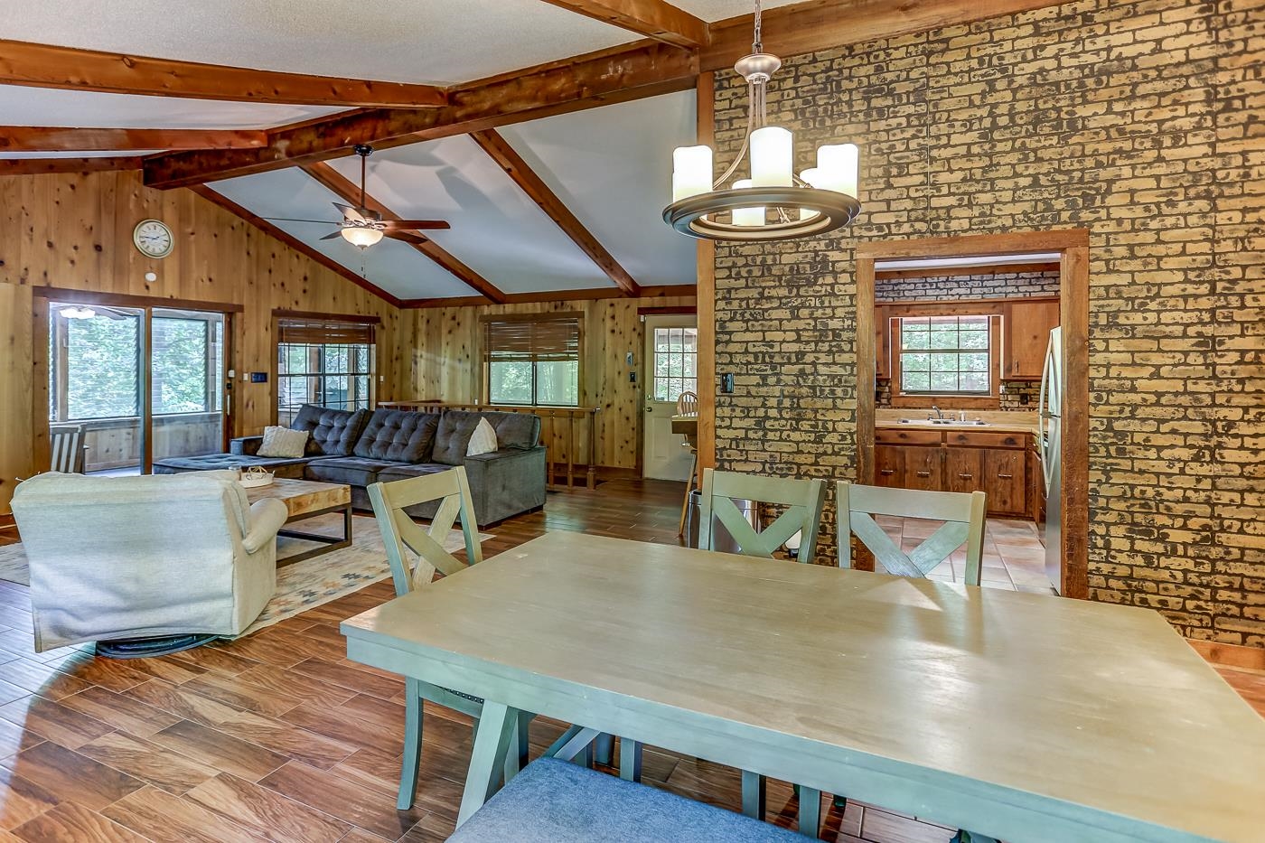 470 Metro Road Eads, TN 38028 - Photo 17 of 40 a dining room with stainless steel appliances kitchen island granite countertop a table chairs and a view of living room
