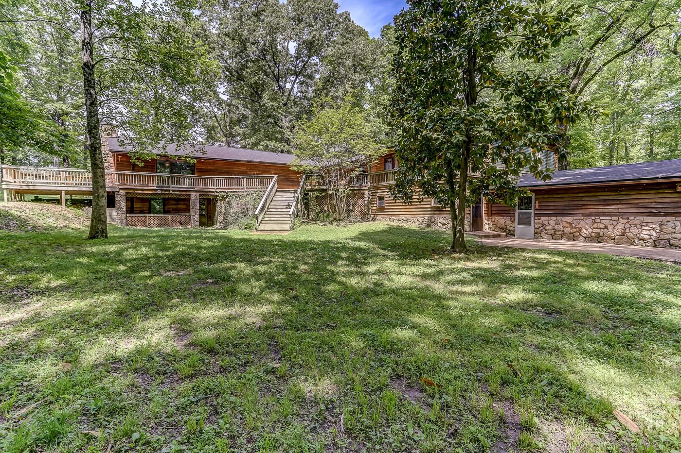 470 Metro Road Eads, TN 38028 - Photo 34 of 40 a view of a house with a big yard and large trees
