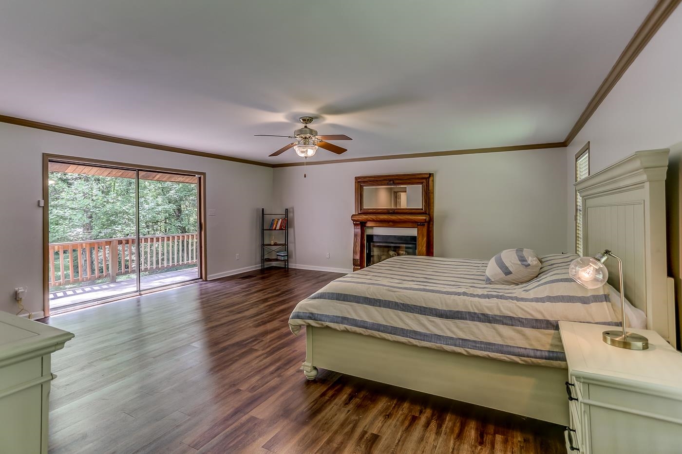 470 Metro Road Eads, TN 38028 - Photo 7 of 40 a bedroom with a bed and wooden floor