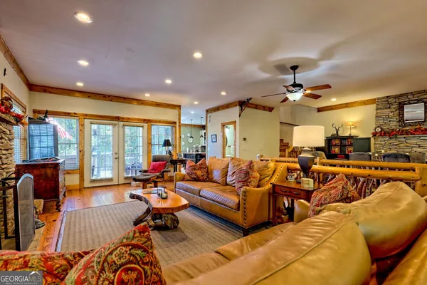 a view of a a dining room with furniture window and outside view