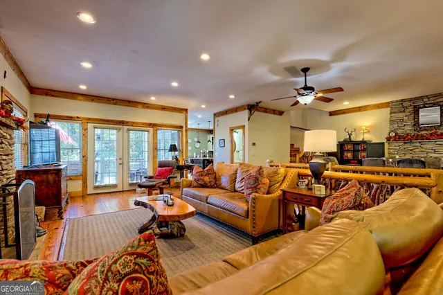 a view of a a dining room with furniture window and outside view
