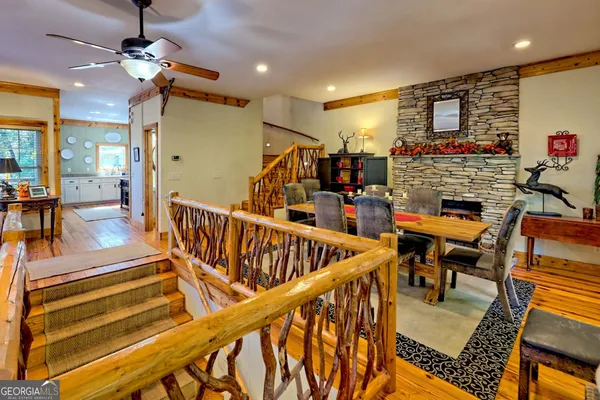 a kitchen with stainless steel appliances a stove a sink and a refrigerator
