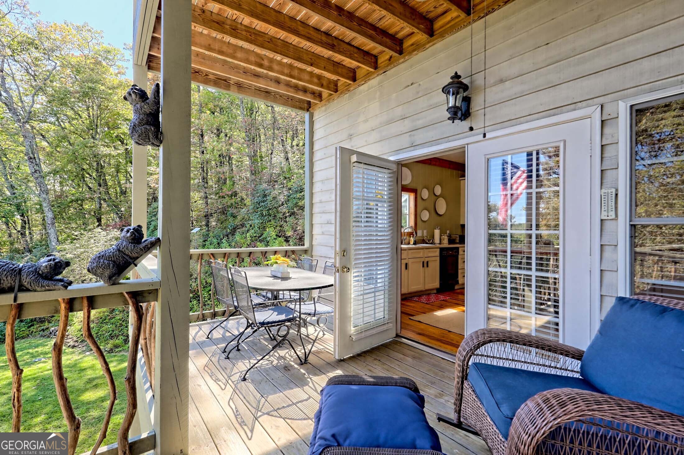 3315 Bald Mountain Road Dillard, GA 30537 - Photo 30 of 79 a living room with furniture and a large window
