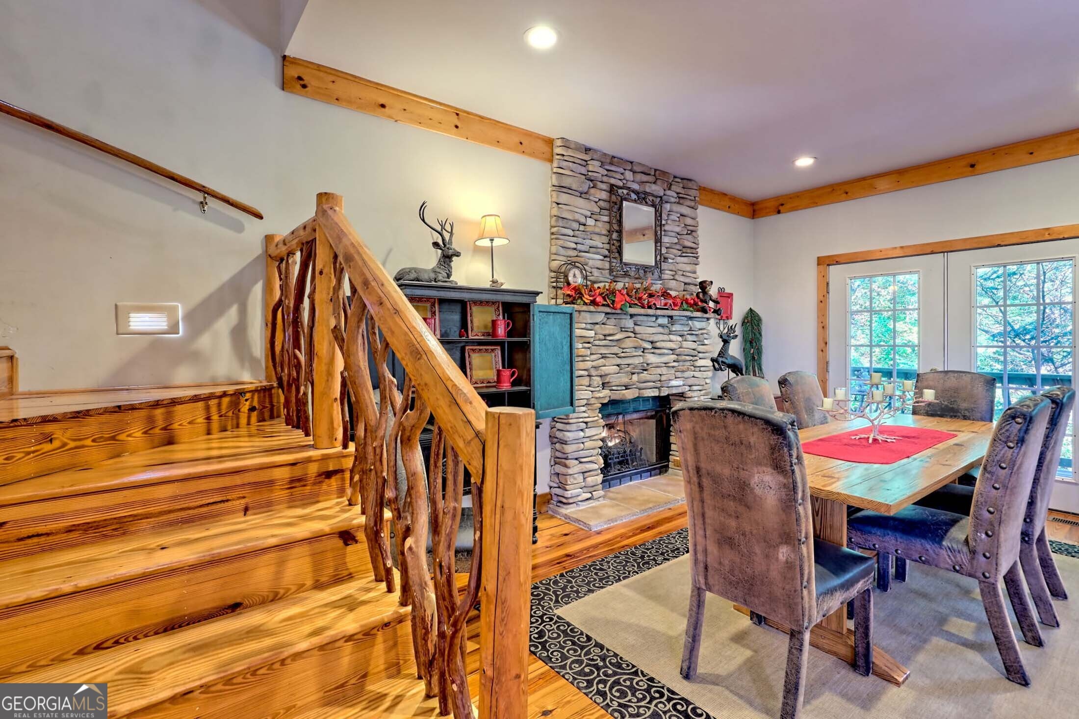 3315 Bald Mountain Road Dillard, GA 30537 - Photo 35 of 79 a dining room with furniture and a floor to ceiling window
