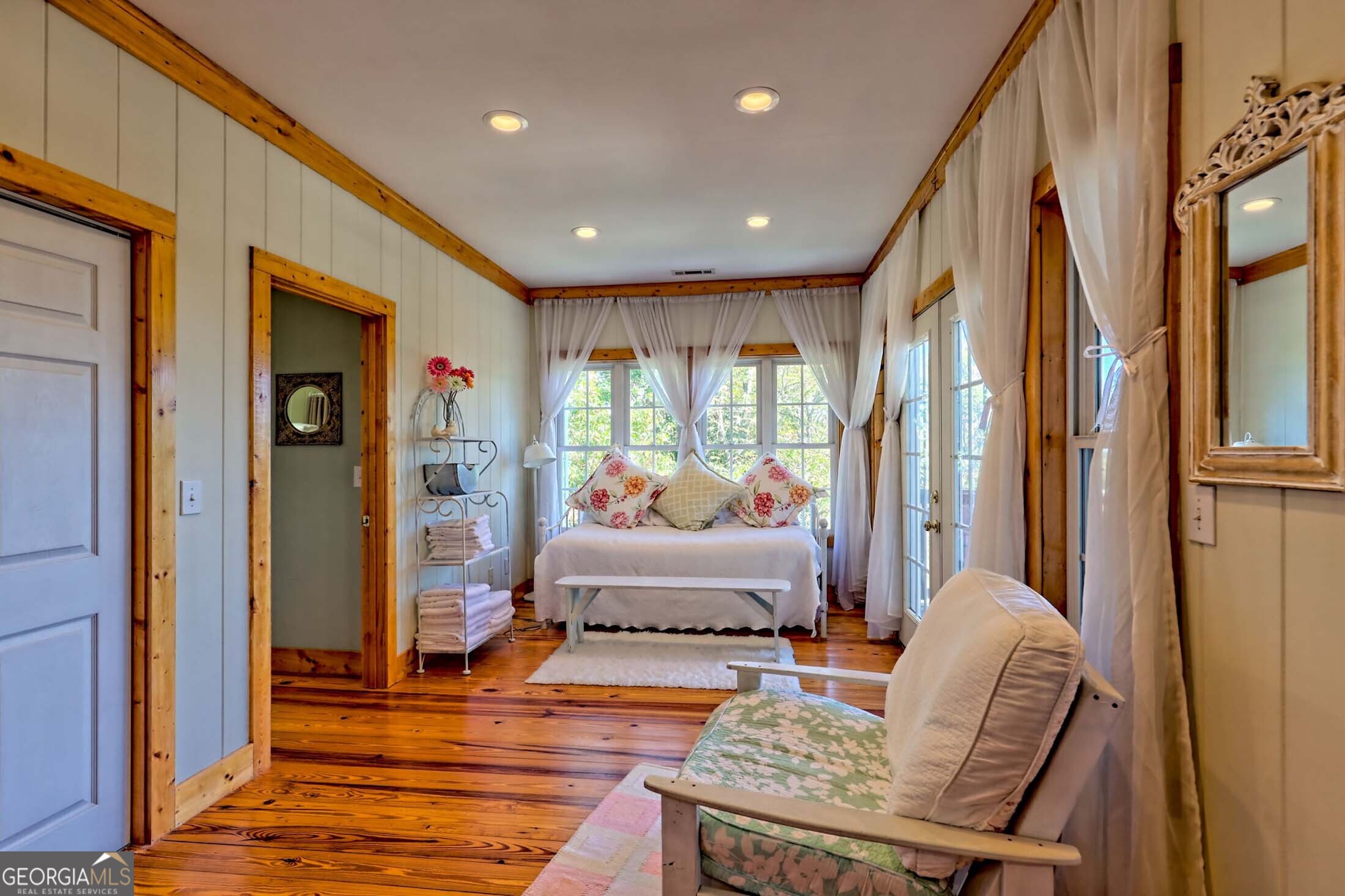 3315 Bald Mountain Road Dillard, GA 30537 - Photo 36 of 79 a living room with furniture and a large window
