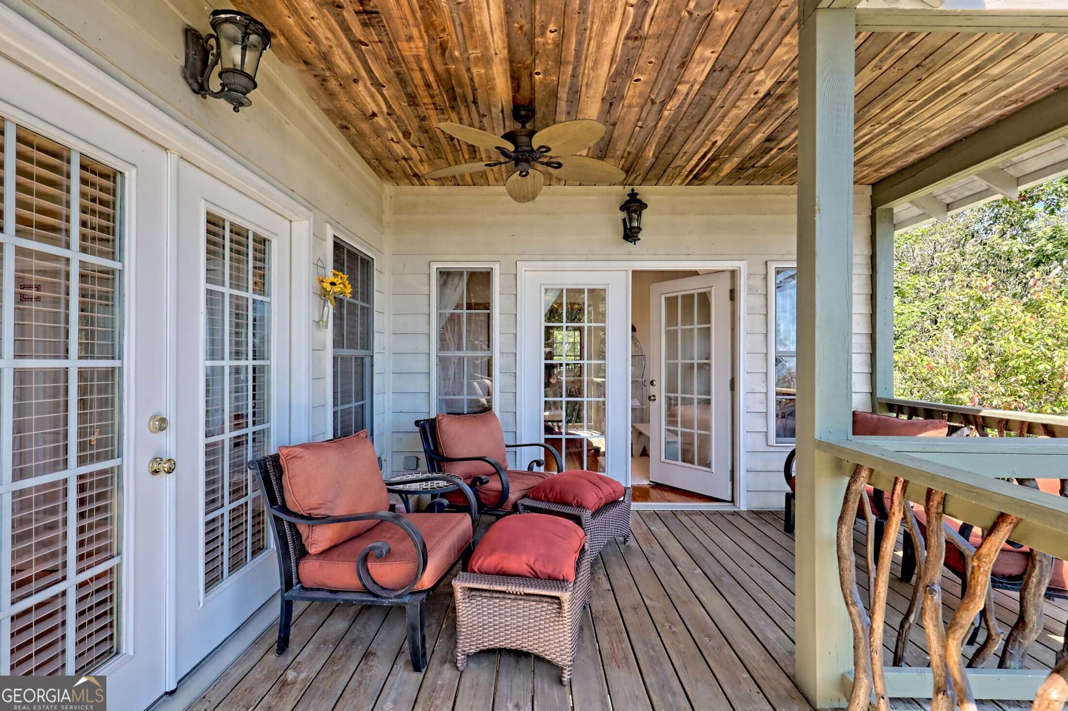 3315 Bald Mountain Road Dillard, GA 30537 - Photo 39 of 79 a balcony with table and chairs