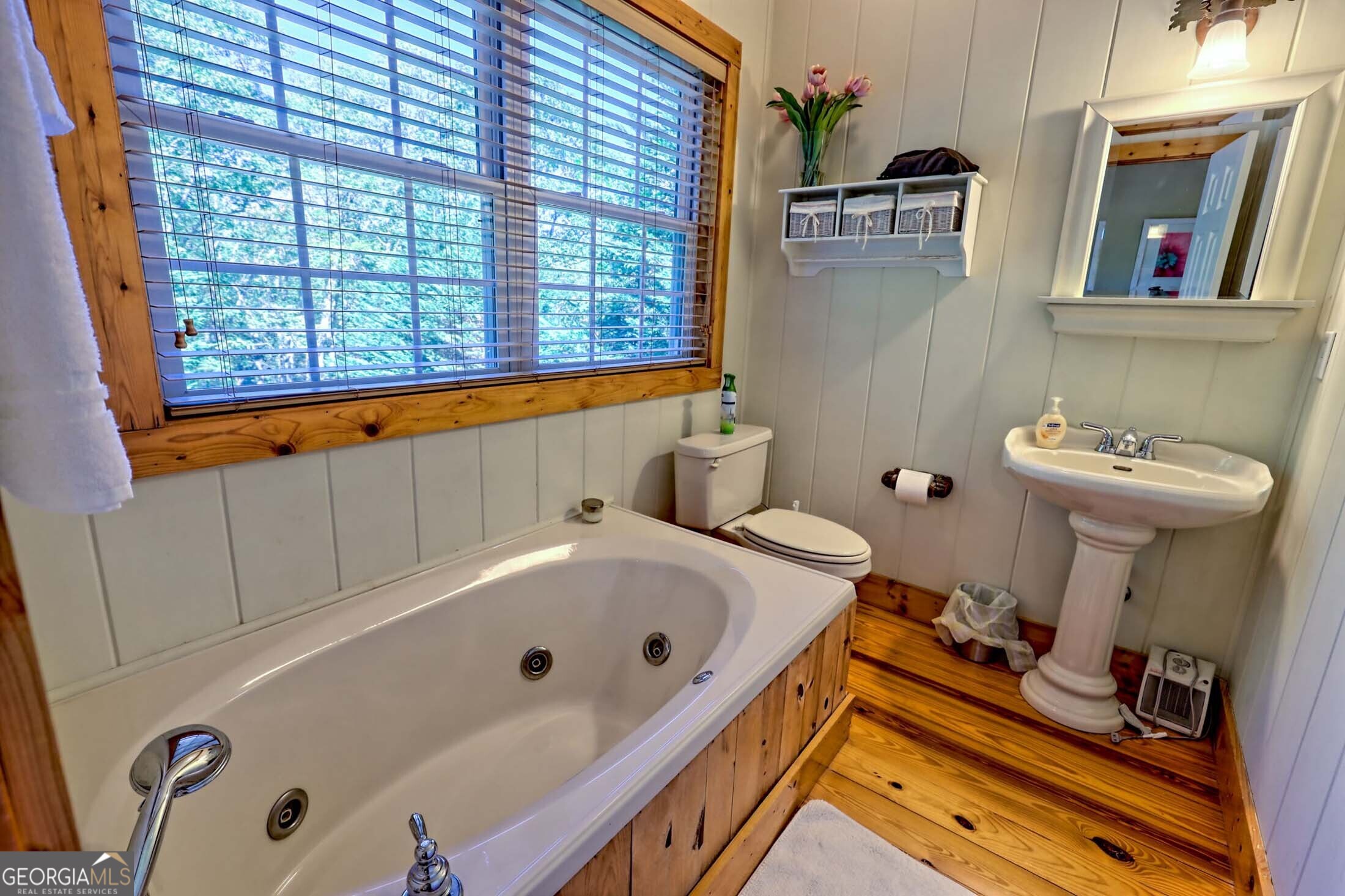 3315 Bald Mountain Road Dillard, GA 30537 - Photo 48 of 79 a bathroom with a sink and a bathtub