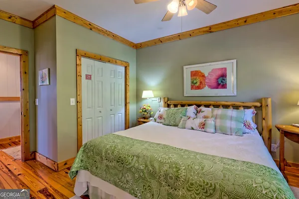 a view of a room with wooden walls