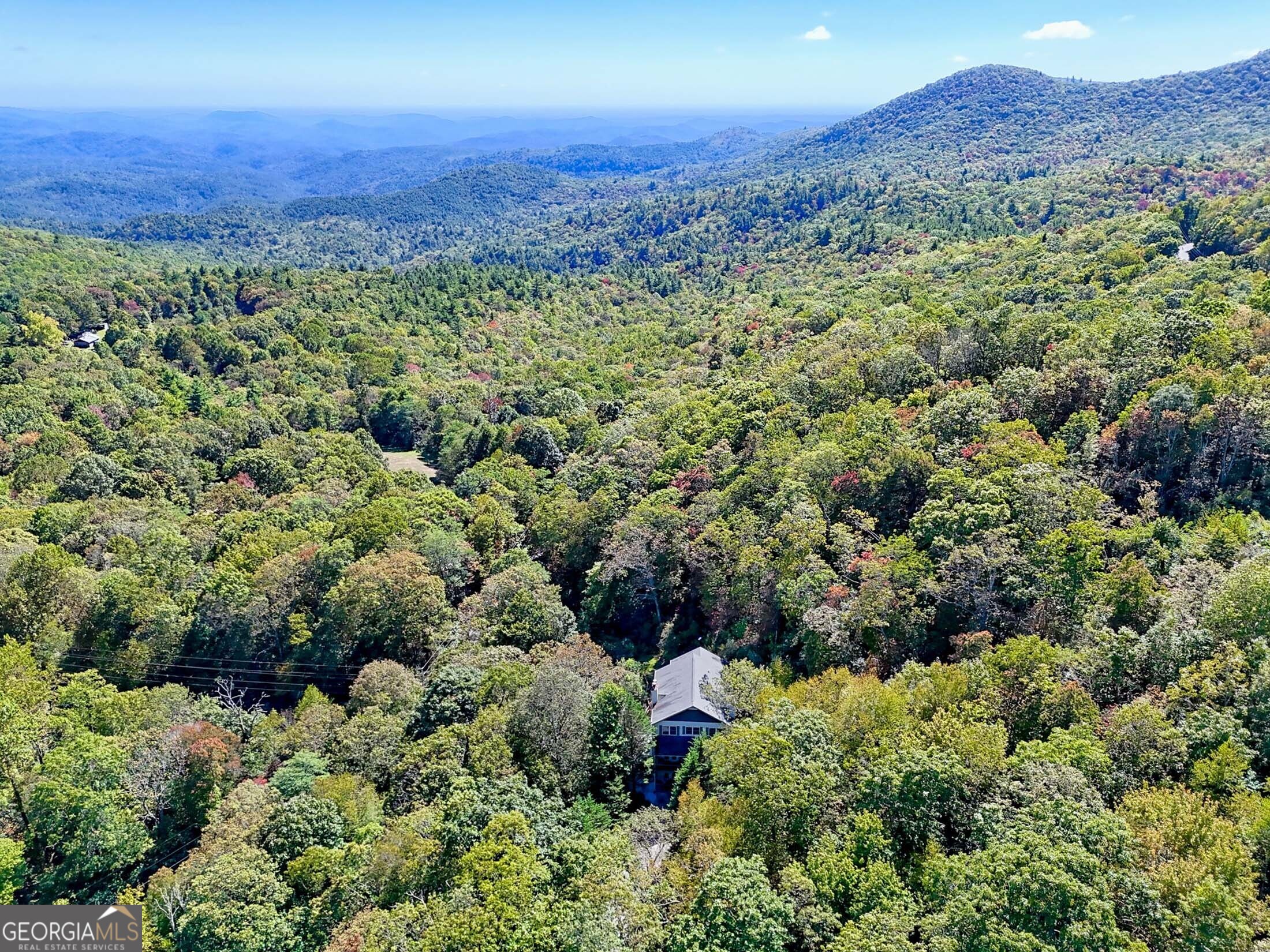 3315 Bald Mountain Road Dillard, GA 30537 - Photo 79 of 79 a view of a lush green field with mountains in the background