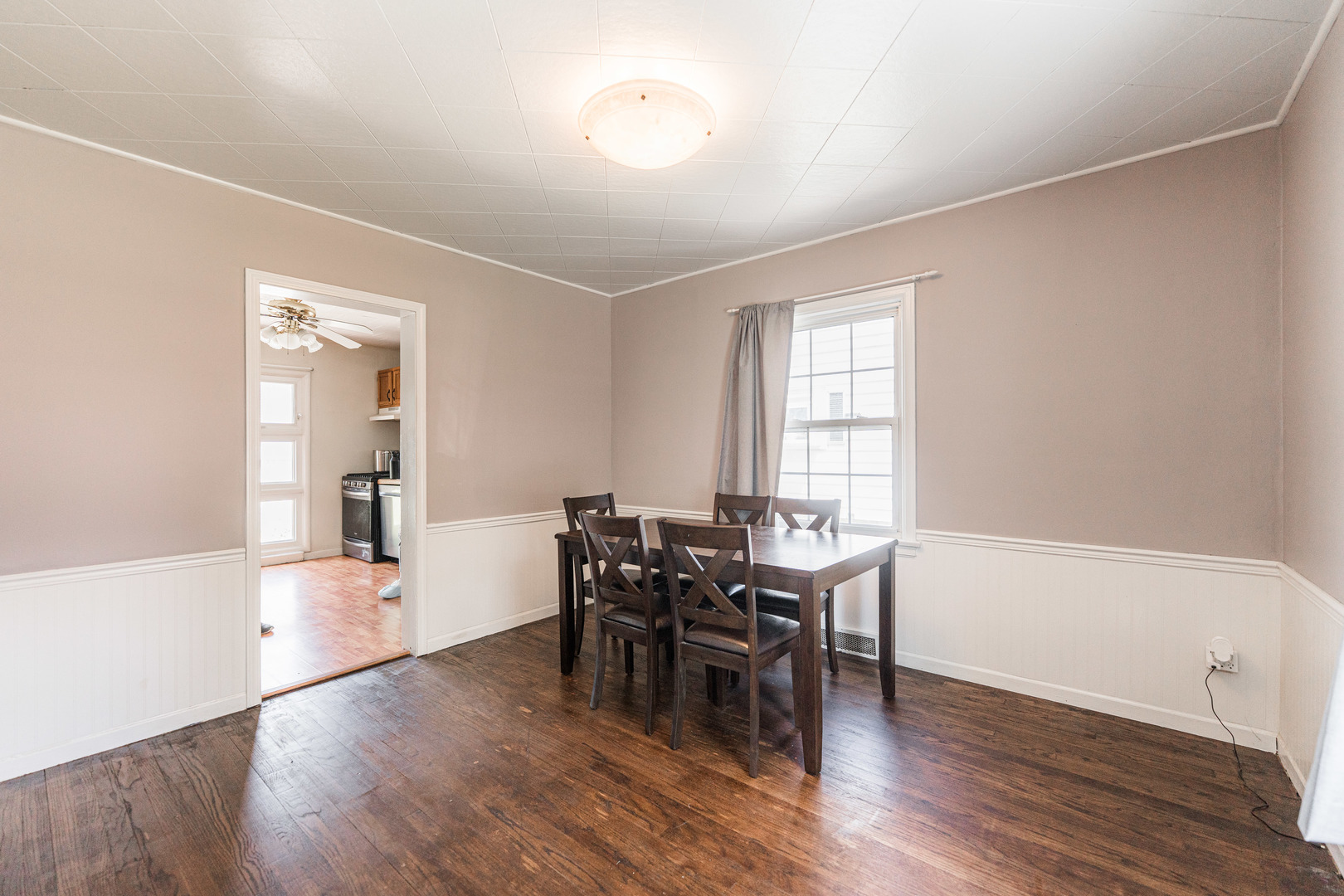 1020 North 8th Street Rochelle, IL 61068 - Photo 6 of 21 a view of a dining room with furniture and wooden floor