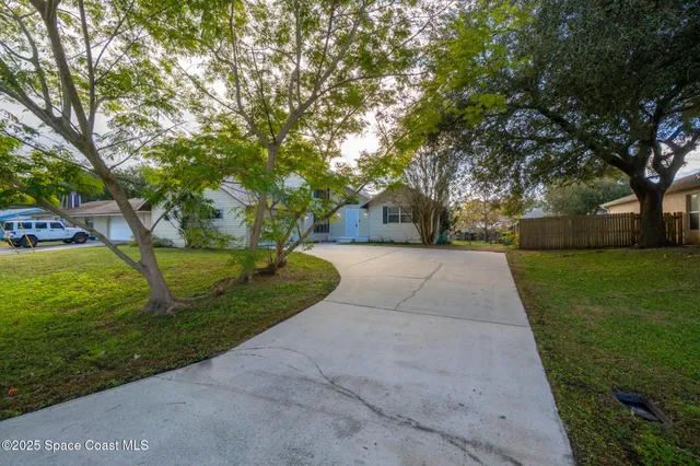 a house view with a garden space
