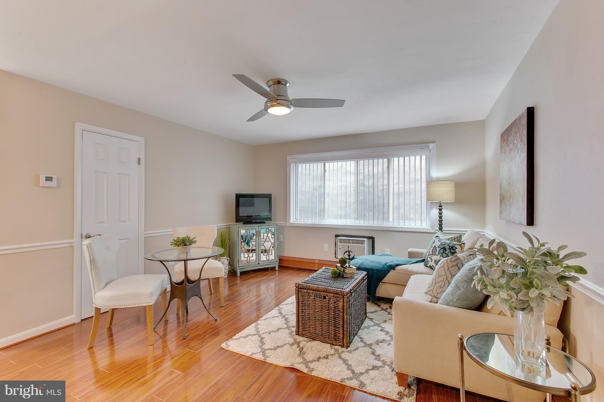 513 12th Street Northeast, Unit 3 Washington, DC 20002 - Photo 3 of 11 a living room with furniture