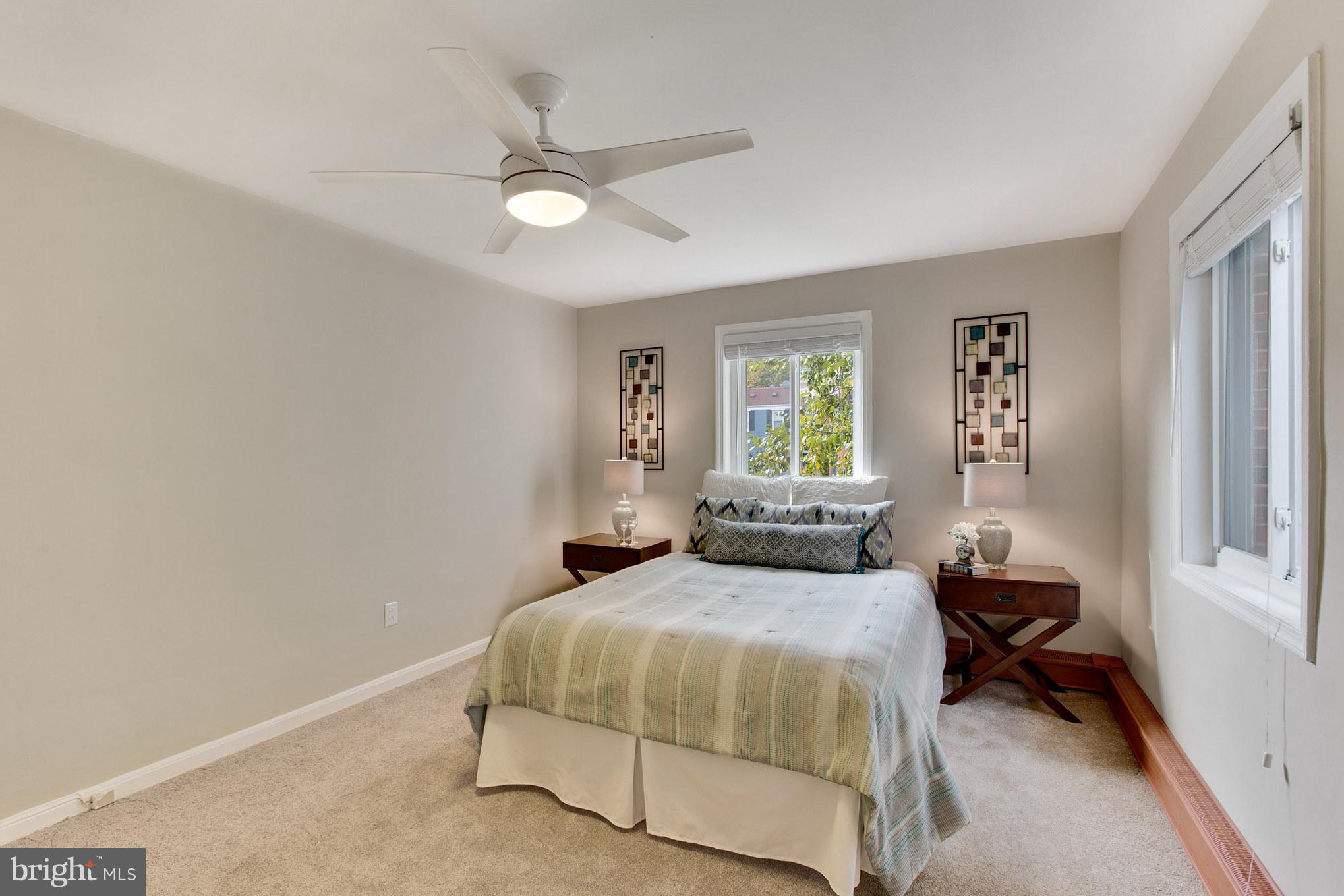 513 12th Street Northeast, Unit 3 Washington, DC 20002 - Photo 7 of 11 a bedroom with a bed and a window