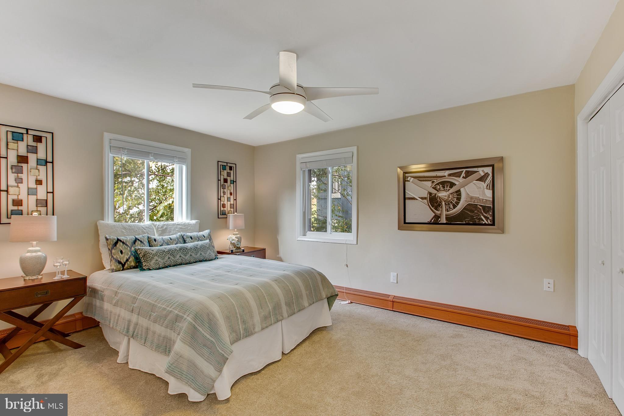 513 12th Street Northeast, Unit 3 Washington, DC 20002 - Photo 8 of 11 a bedroom with a bed and window