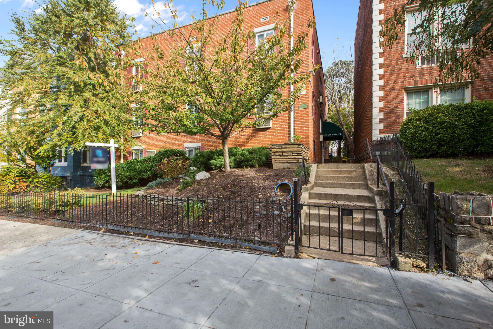 513 12th Street Northeast, Unit 3 Washington, DC 20002 - Photo 10 of 11 a view of a house with a yard