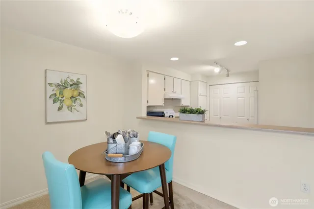 a view of a dining room with furniture