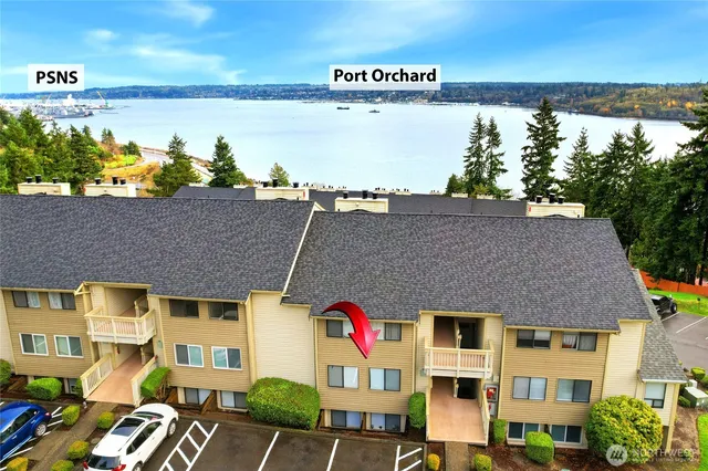 a view of swimming pool with seating area