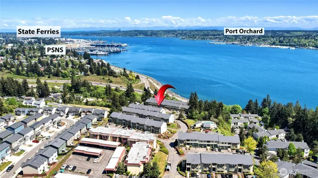 an aerial view of a swimming pool patio and mountain view