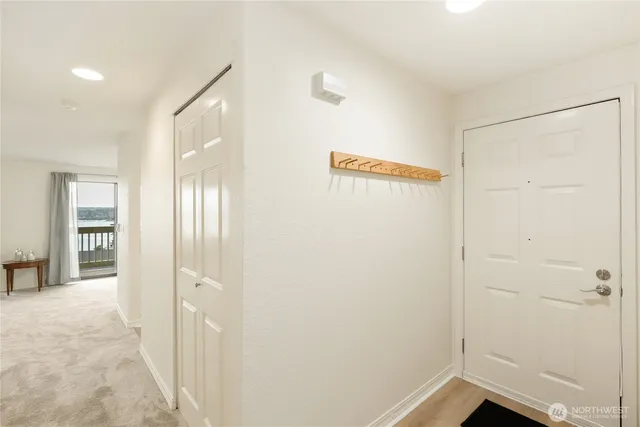 a view of hallway with closet